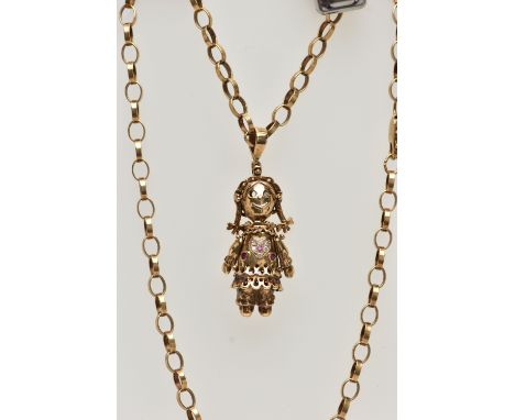 A 9CT GOLD RAG DOLL PENDANT AND CHAIN, articulated rag doll pendant, set with three rubies and colourless paste to the body a