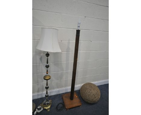 AN ART DECO WALNUT STANDARD LAMP, a brass and marble effect standard lamp, another standard lamp, a nest style shade and an A