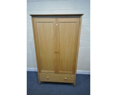 A LIGHT OAK ERCOL TERAMO WARDROBE, with two doors, above a single drawer, model number 2686, width 112cm x depth 61cm x heigh