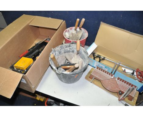 A BOX AND TWO BUCKETS OF TOOLS to include mostly building tools such as two cement buckets containing trowels, chisels, hamme