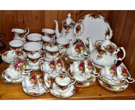 A FIFTY PIECE ROYAL ALBERT OLD COUNTRY ROSES TEA SET ETC, comprising a teapot, a coffee pot, a cake plate, two salad plates, 