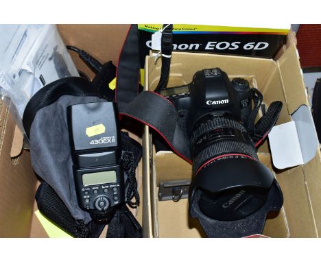 A BOXED CANON EOS 6D FULL FRAME DIGITAL SLR CAMERA BODY with two batteries, charger, cables, software and manual along with a