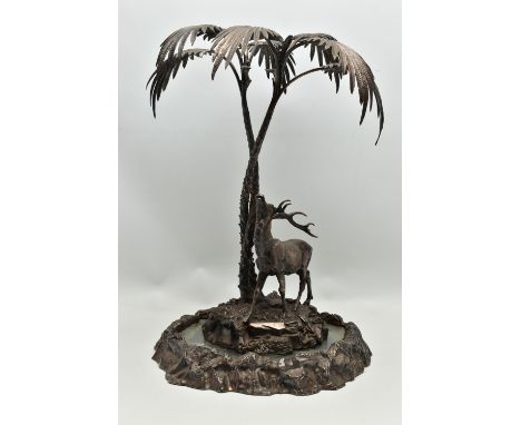 A VICTORIAN ELKINGTON &amp; CO SILVER PLATED CENTREPIECE WITH MATCHING MIRRORED STAND, the centrepiece cast as two entwined p