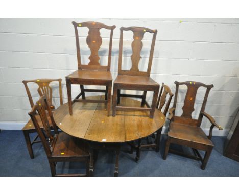 A GEORGIAN OAK OVAL GATE LEG TABLE, open length 132cm x closed length 39cm x depth 107cm x height 71cm, and six oak splat bac