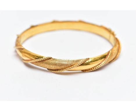 A MODERN ASIAN HINGED BANGLE, approximate inner diameter 61mm, stamped 916, tested and assessed as 22ct yellow gold, far east