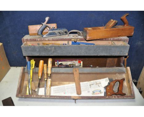 A WOODEN TOOLBOX with hinged fall front containing mostly woodworking tools, files, saws, chisels, planes and marking equipme