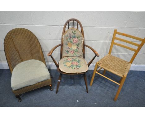 A LLOYD LOOM GOLD PAINTED BEDROOM CHAIR, an Ercol quaker armchair, with two loose cushions, and a beech rush seated chair (co