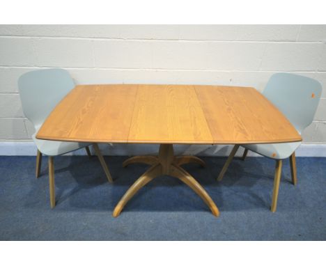 AN ERCOL BLONDE ELM WINDOR EXTENDING DINING TABLE, with a single fold out leaf, on a single pedestal with four shaped legs, e