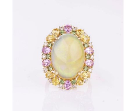 Großer Opal-Cocktailring mit farbigen Saphiren und Brillanten. 18 kt. GG, gest. Der helle, ovale Opal 13,07 ct. (ca. 19 x 14 