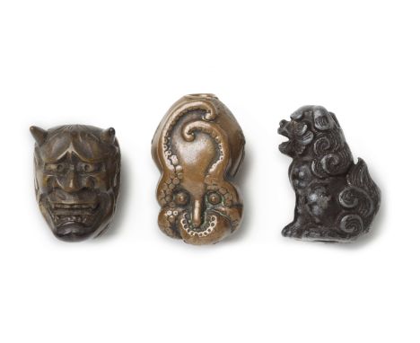 THREE OJIME OF DIFFERENT MATERIALSMeiji era (1868-1912), late 19th/early 20th centuryComprising a wood double-mask ojime depi