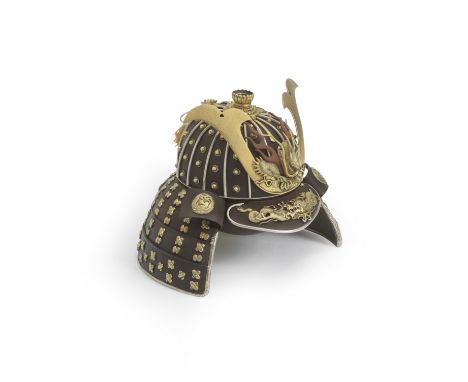 AN IRON, SILVER AND GILT KORO (INCENSE BURNER) IN THE FORM OF A 16-PLATE SUJIBACHI KABUTO (RIDGED HELMET)Meiji era (1868-1912