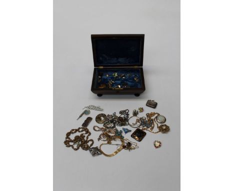 A collection of silver and costume jewellery to include two as found silver and enamel brooches, a silver and enamel pill loc