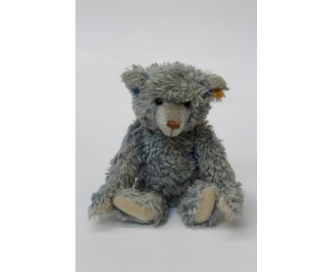 Steiff, a late 20th century fully jointed teddy bear, with brown eyes, powder blue mohair fur and growling mechanism ( functi