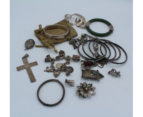 A collection of vintage and antique silver jewellery to include a watch and Albert charm bracelet and other items