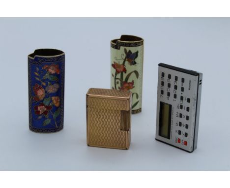A collection of cigarette lighters and cases. Comprising a gold plated JC Dupont, Paris vintage lighter, 1 1980's Manman calc