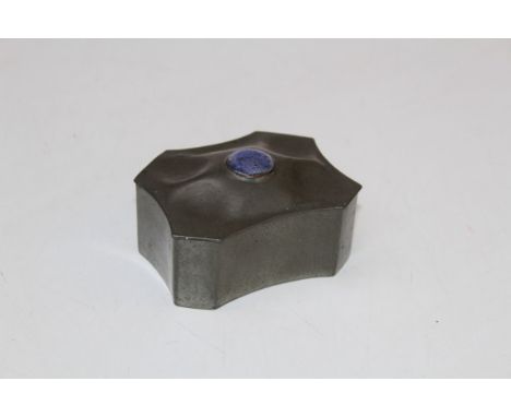 A Liberty and Co pewter hinged box and cover, of rectangular form with canted corners and concave edges, the lid with four de