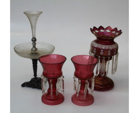 A pair of 20th century cranberry glass table lustres, each of inverted bell form, suspending icicle drops, 25.5cm high, toget