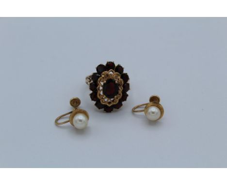 A 14ct gold garnet cluster ring, size Q, gross weight approximately 7.5gm, along with a pair of cultured pearl screwback earr