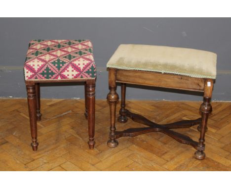 An early 20th Century piano stool, with plush upholstered rising seat, raised on turned supports united by a cross stretcher,