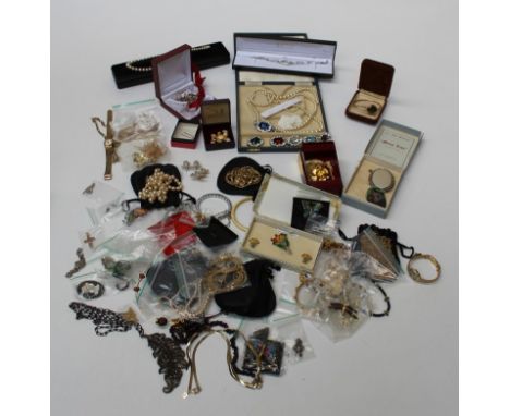 A large quantity of vintage and contemporary costume jewellery to include an interchangeable clasp pearl necklace ( as found)