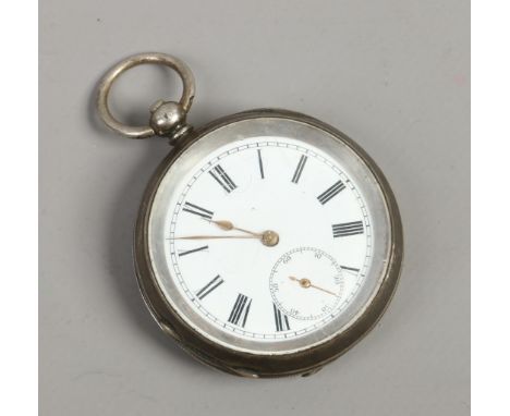 A continental silver cased pocket watch with enamel dial and subsidiary seconds.