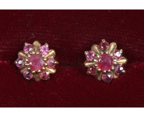 A pair of 9ct gold ruby cluster earrings.