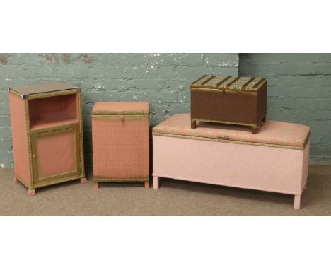 Four pieces of basketware to include ottoman, linen box, sewing box and bedside cabinet.