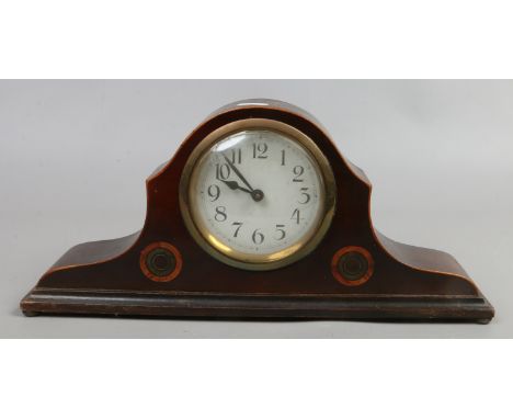 An Edwardian mahogany dome top mantel clock.