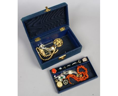 A jewellery box and contents to include dress rings, fob watch, brooches and marcasite wristwatch.