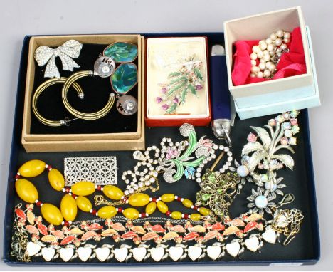 A tray of costume jewellery including paste brooches, Vivienne Westwood dress jewellery, pocket knife and amber effect beads.