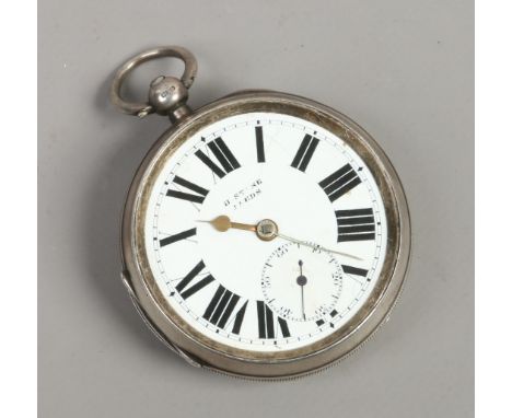 An Edwardian silver cased pocket watch with enamel dial and subsidiary seconds, assayed Birmingham 1902. Condition Report. To