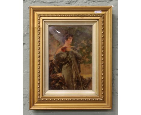 A gilt frame crystoleum portrait of a maiden.