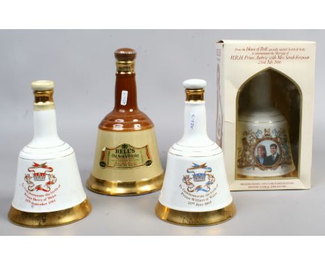Four sealed Wade decanters of Bell's Scotch Whisky to include boxed example.