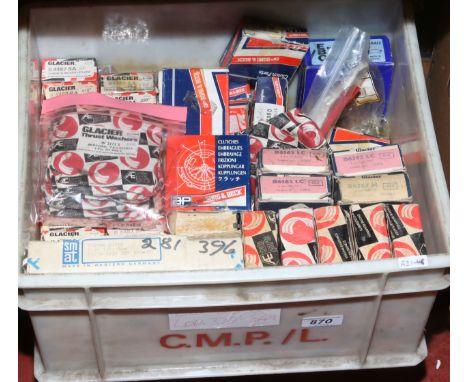 A box of 1970s and 1980 engine parts.