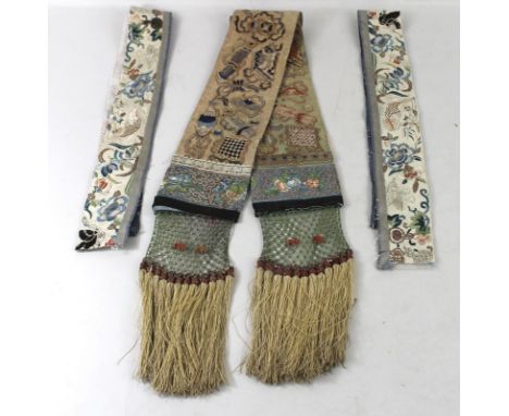 A Chinese 19th century silk sash, with tassels 131 by 8cm., and a pair collars or sleeve cuffs, 63 by 5cm.