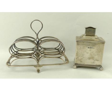 A silver tea caddy, of square form, London 1900, 8 by 6.5 by 11cm, and a Victorian four division toast rack, London 1873, 12.