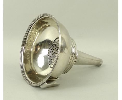 A William IV silver wine funnel, in two parts, with plain thumbpiece, London 1832, no sponsor's marks, 3.71toz, 8.5 by 10.5cm