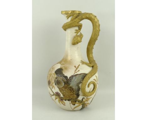 A jug attributed to Charles Baldwyn at Royal Worcester, painted with an owl, with swallows verso and salamander handle, in br