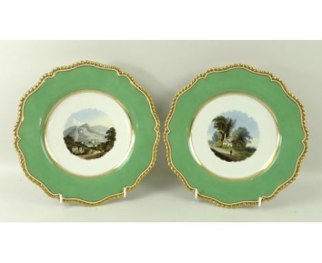 A pair of early 19th century Worcester Flight Barr & Barr cabinet plates, the handpainted roundels to the centre depicting 'C