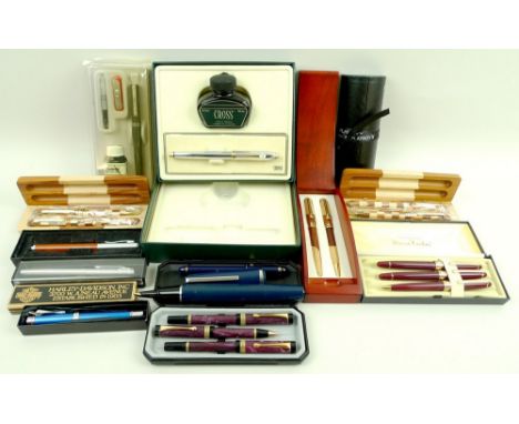 A small collection of fountain and ball point pens, promotional and others, to include a Cross fountain pen, silver metal wit