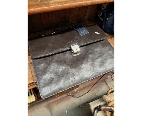 Osborne leather satchel / briefcase, with label attached. 