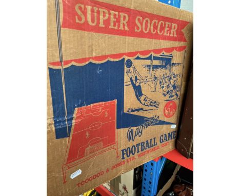 A boxed vintage Super Soccer table top football game. 