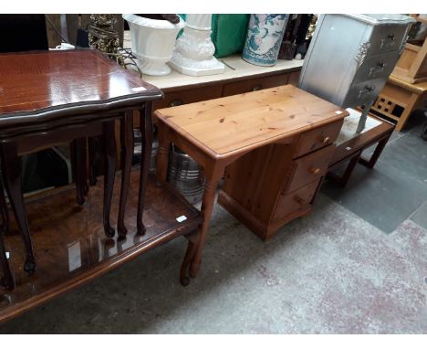 Five pieces of furniture comprising a French style chest, a pine knee hole dressing table, a tile top nest of tables, a mahog