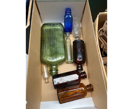 A selection of vintage glass bottles including Sanizal Poison bottle etc. 