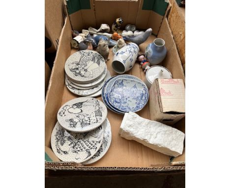 A box of pottery including Royal Copenhagen, Royal Worcester, and 12 signed Bjorn Wimblad wall plaques for the months of the 