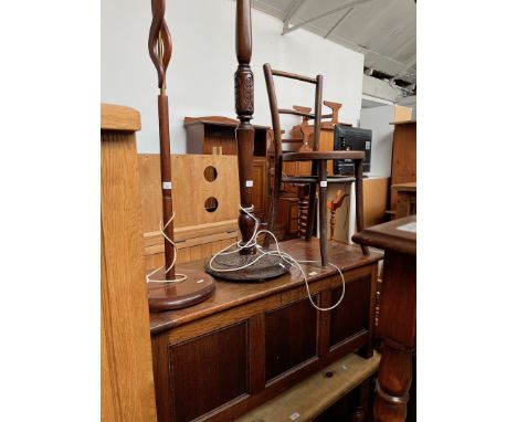 A mid 20th century teak and brass standard lamp, together with another standard lamp, a 1920s oak bedding box and a bentwood 