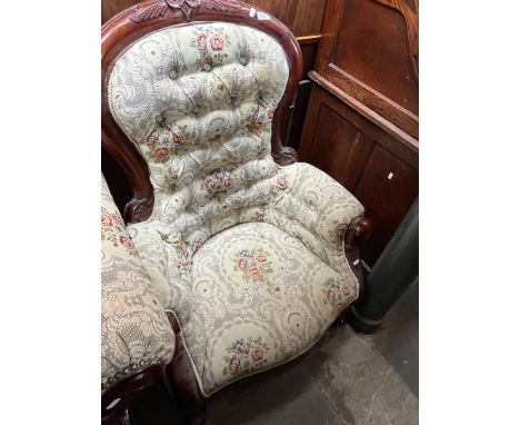 A reproduction Victorian style button back armchair. 