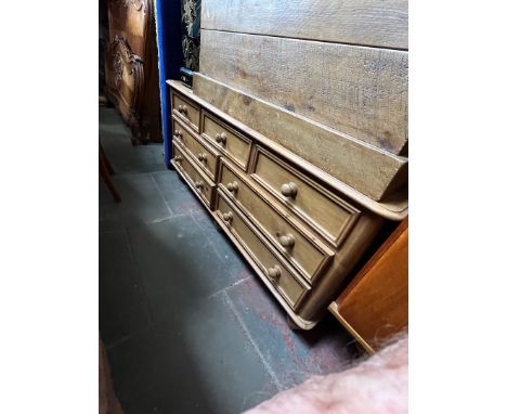 A long pine chest of drawers.Condition- some general wear to include light surface marks.Top drawer's length : 44.5cmBottom d
