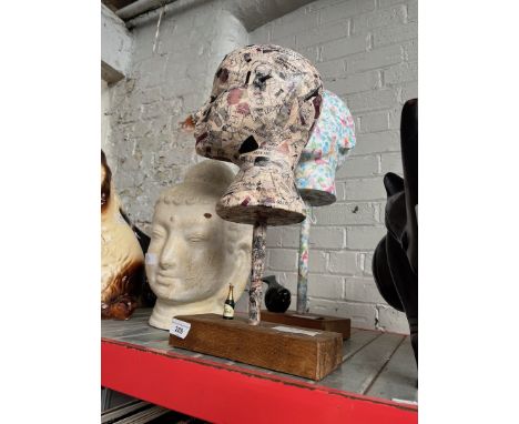 2 papier mache heads and a ceramic Indonesian style Buddha 