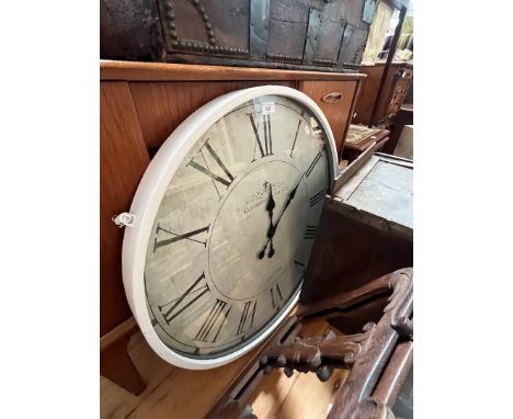 A large vintage style wall clock, diameter 71cm. 